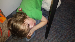 Awoken by my flash....Although sick, he looked so peaceful and snuggled up. 